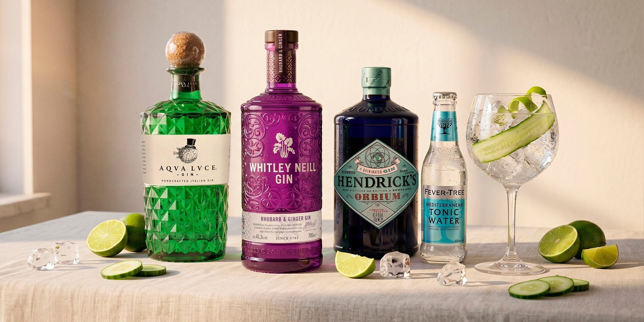 Premium gin selection with gin bottles tonic water lime cucumber and ice from MyDrinx