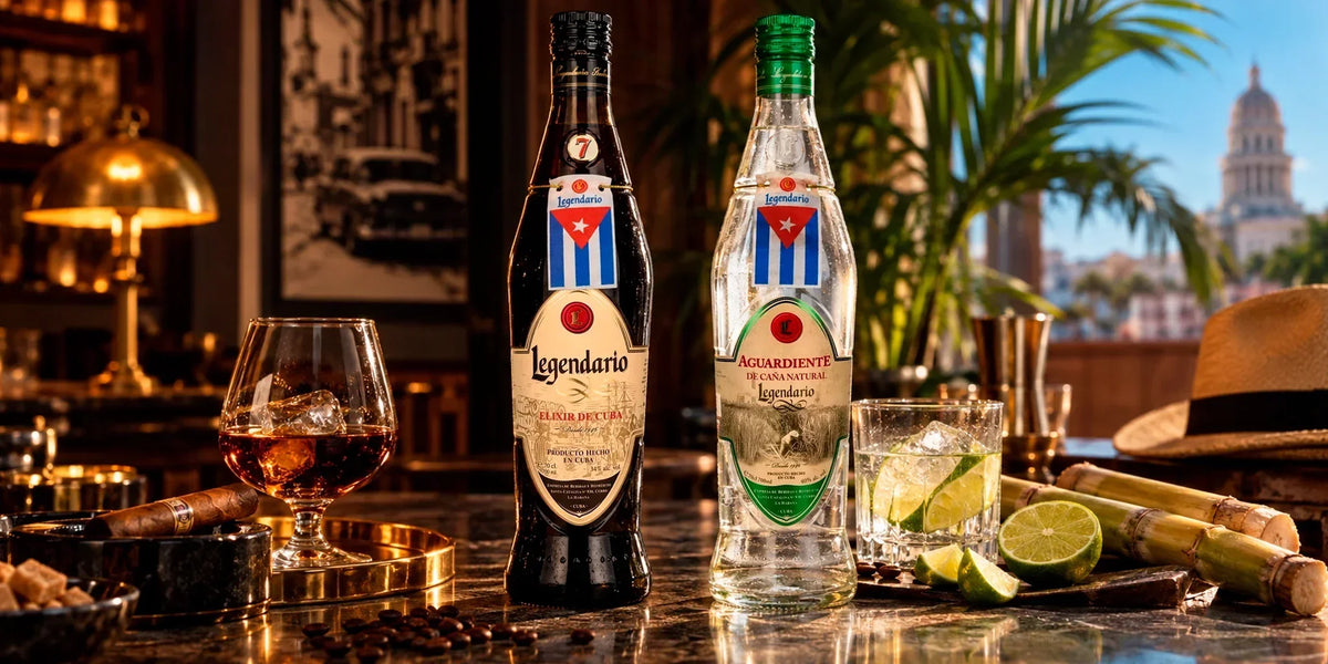 Legendario Elixir de Cuba and Legendario Aguardiente de Caña Natural bottles styled in a warm Cuban bar setting with rum glasses, lime, sugar cane and Havana-inspired tropical atmosphere.